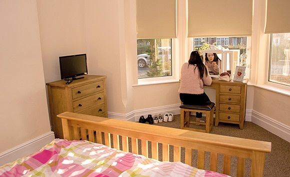 Braidley House - Girl in room